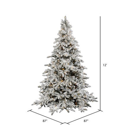 12 feet Flocked Mountain Utica Christmas Tree featuring 4768 PVC Tips and 2000 LED Warm White Italian Lights.